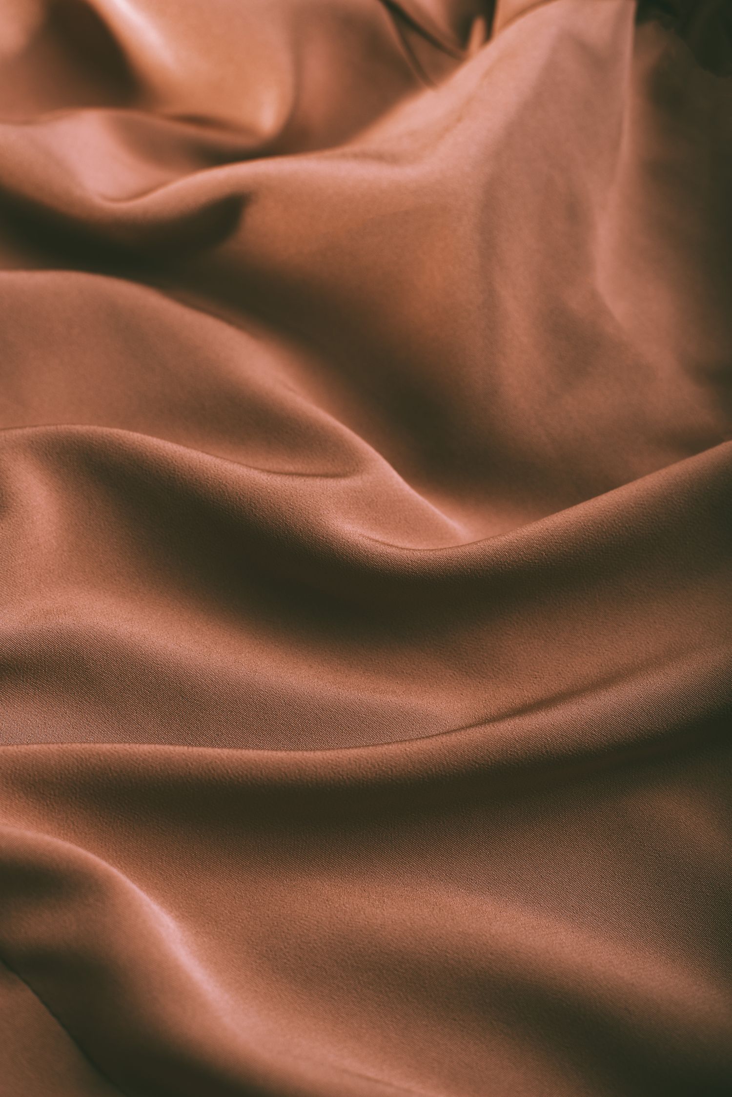 Soft, lustrous fabric in a warm shade of brown
